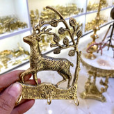 جاکلیدی دیواری برنجی مدل غزال با شاخهای کشیده، قلابهای آویز مقاوم، پرداخت طلایی براق متالوکس - بازرگانی نداف