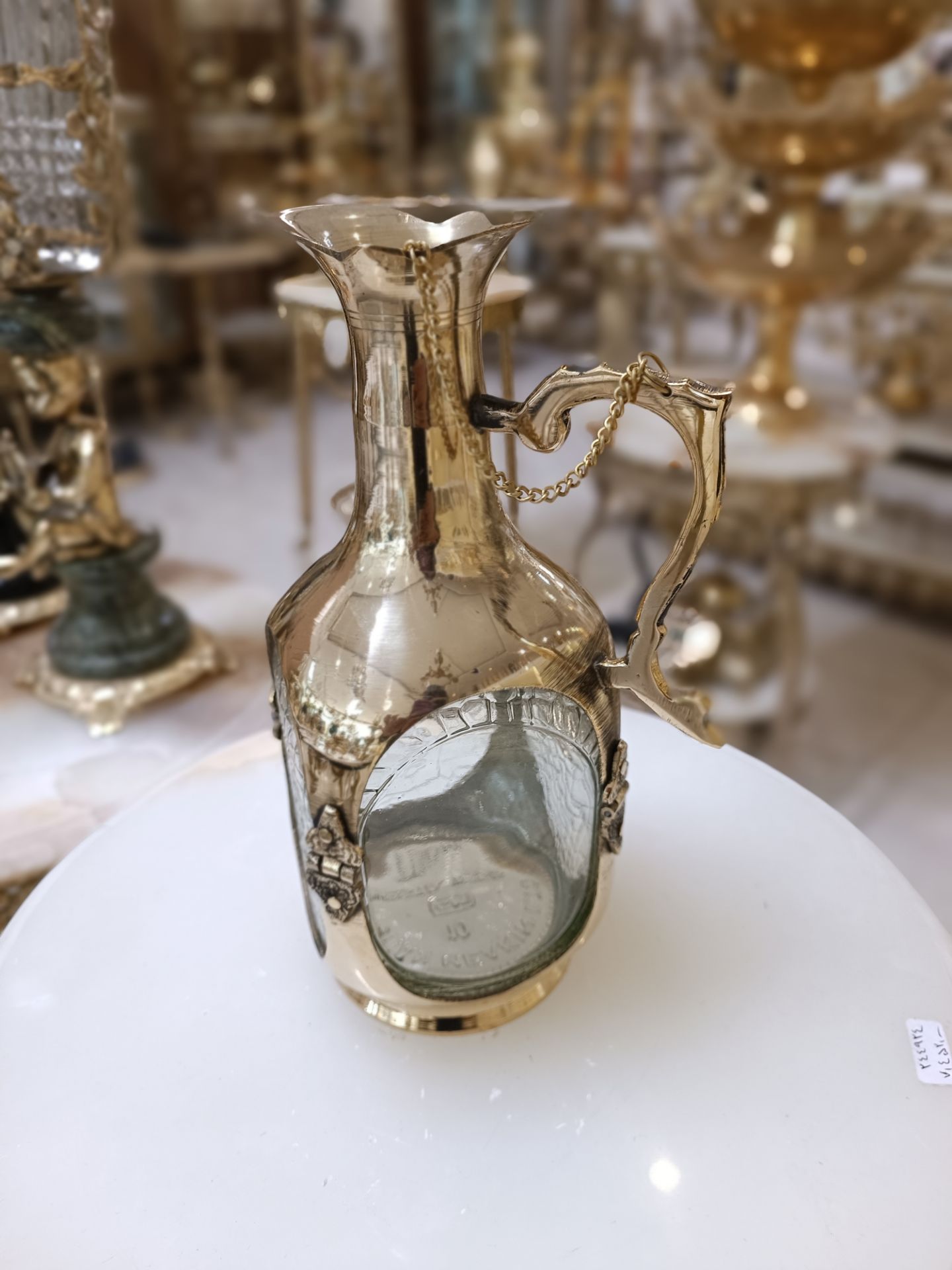 بطري شيشه اي زنجيره دار برنجی