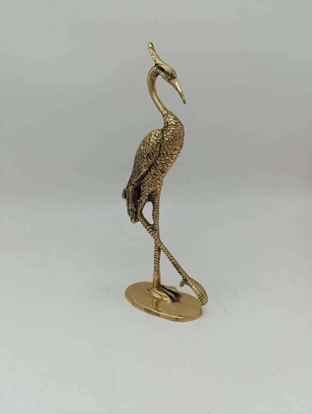 مجسمه فلامینگو برنجی تکی با طراحی ظریف گردن و پرها، روی پایه بیضی شکل، اکسسوری دکوری لوکس برند متالوکس