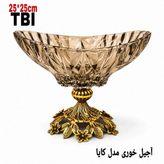 آجیلخوری مدل کایا با کاسه کریستال دودی تراشخورده و پایه برنجی طرح گل، محصولی لوکس و پرطرفدار از گالری متالوکس